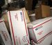 postal-service-priority-mail-boxes-move-on-a-conveyor-belt-news-photo-1650906277